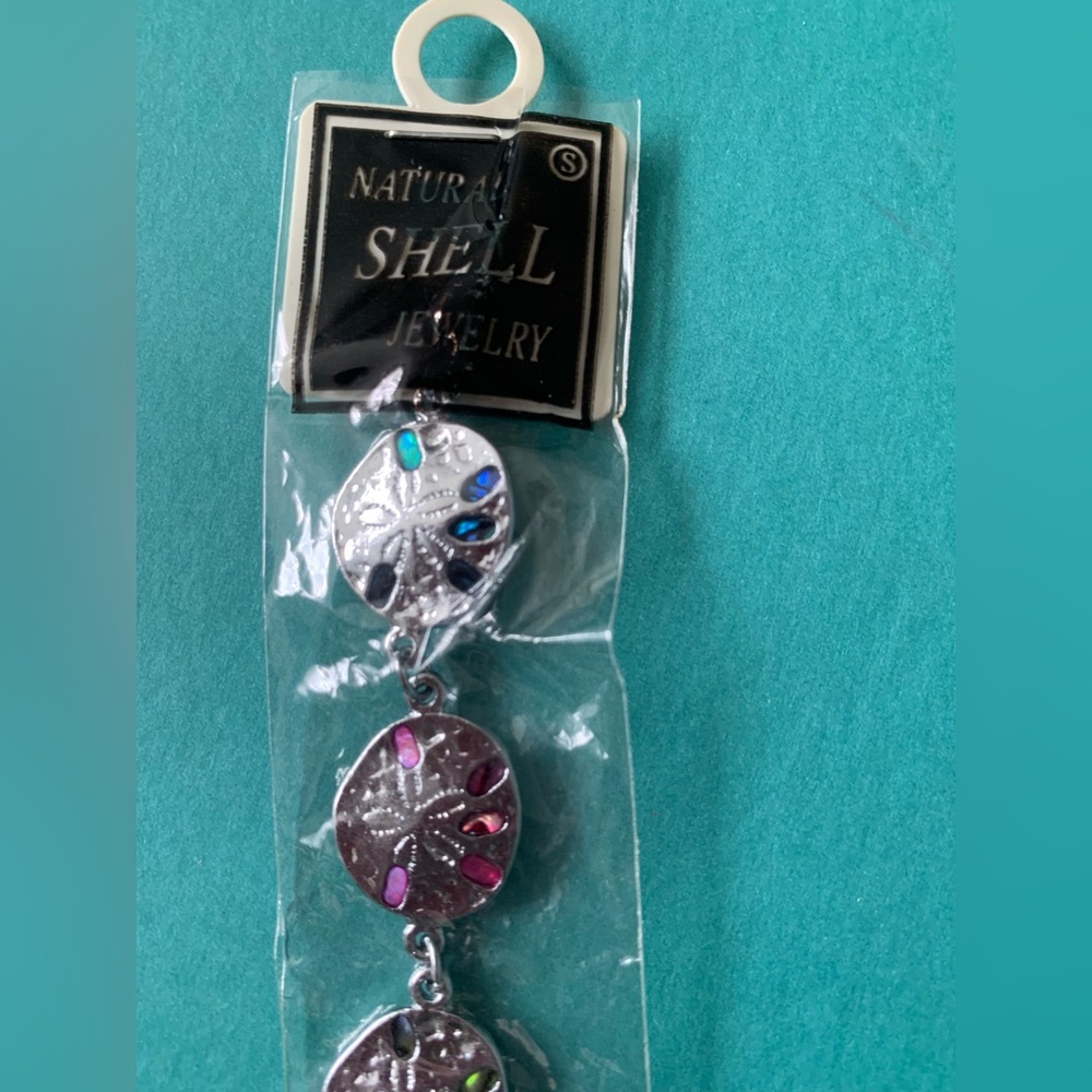 Silver tone Sand dollar design bracelet with natural Shell Multicolour Accents